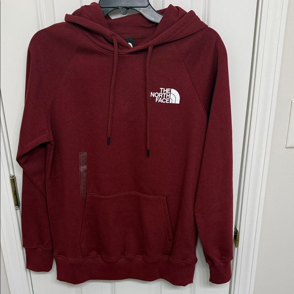 North face Burgundy Sweater with styled message, front and back.